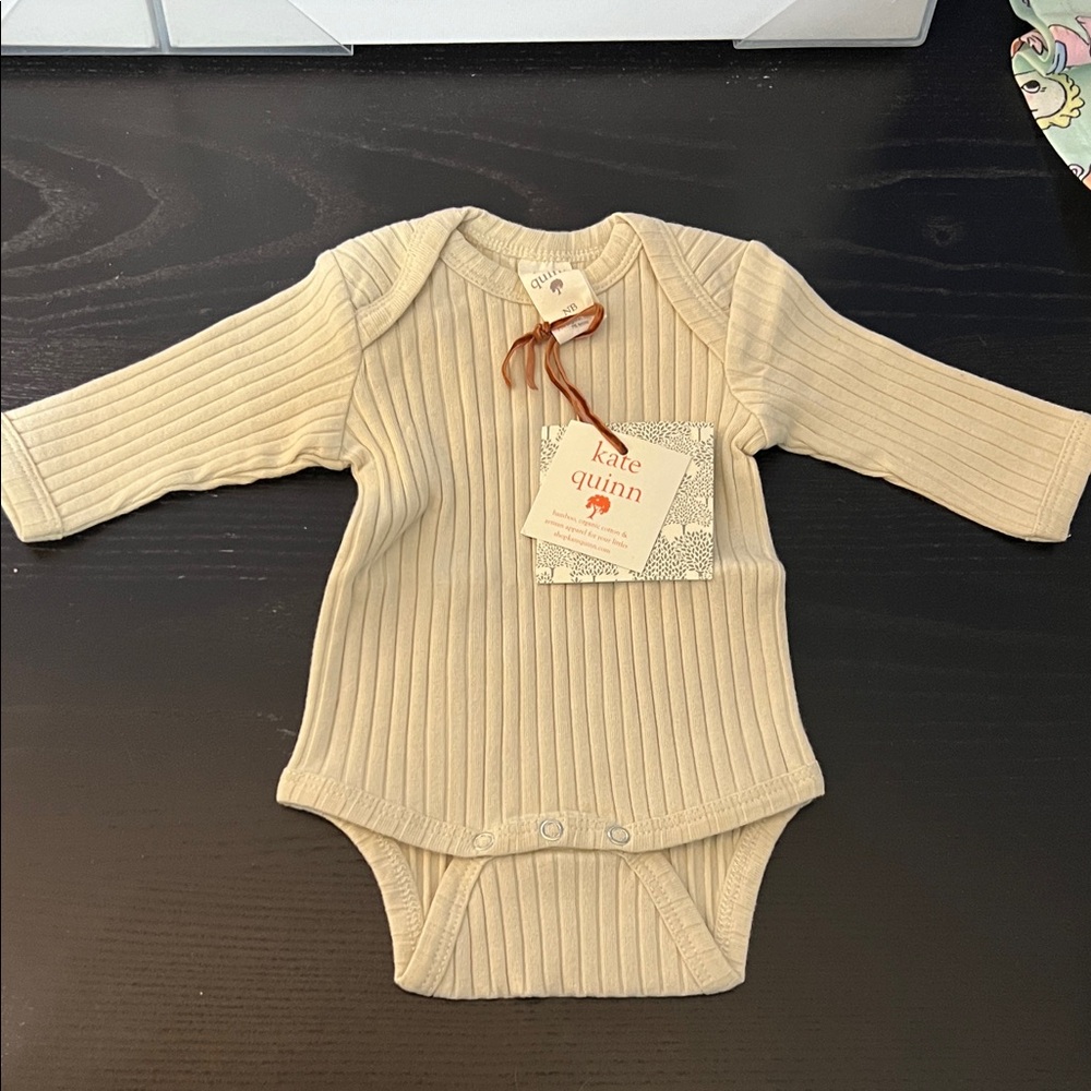 Kate Quinn Cream Ribbed Bodysuit